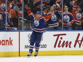 Connor McDavid of the Oilers celebrates a goal in front of cheering fans during the first period against the Los Angeles Kings at Rogers Place in Edmonton on Tuesday night.