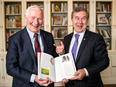 Governor General David Johnston, left, and former tech CEO Tom Jenkins with their new book, Ingenious: How Canadian Innovators Made the World Smarter, Smaller, Kinder, Safer, Healthier, Wealthier and Happier at Rideau Hall.