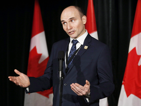 Social Development Minister Jean-Yves Duclos speaks to reporters at a Liberal cabinet retreat in Calgary on Jan. 24, 2017.