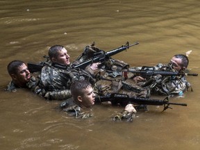 Soldiers from the U.S. Army's 25th Infantry Division 1st Stryker Brigade Combat Team participate in jungle warfare training at Schofield Barracks, Hawaii, March 1, 2017.
