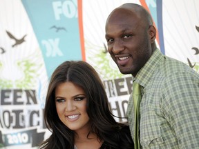 This Aug. 8, 2010 file photo shows Khloe Kardashian and Lamar Odom arriving at the Teen Choice Awards in Universal City, Calif.