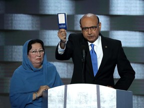 Khizr Khan, father of deceased Muslim U.S. Soldier Humayun S. M. Khan, holds up a booklet of the U.S. Constitution as he speaks at the Democratic National Convention at the Wells Fargo Center, July 28, 2016 in Philadelphia, Pennsylvania.