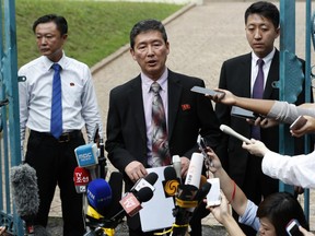 Ri Tong Il, former North Korean deputy ambassador to the United Nations, speaks to journalist outside the North Korean embassy in Kuala Lumpur, Malaysia on Thursday, March 2, 2017