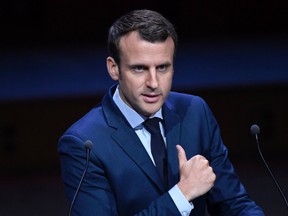 French presidential candidate for the "En Marche" movement Emmanuel Macron delivers a speech at the Maison de la Radio in Paris on March 22, 2017.