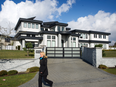 Super-sized houses, some are as large as 22,000 square feet, have become a pain in Richmond, B.C.. Politicians like Richmond city councillor Carol Day call for regulating these mega-homes, built on traditional farming land.