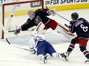 Toronto Maple Leafs forward Nazem Kadri, left, scores on Columbus Blue Jackets goalie Joonas Korpisalo on March 22.