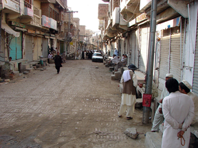 Local tribesmen gather at a closed market in Miranshah, the capital of North Waziristan in September 2010.