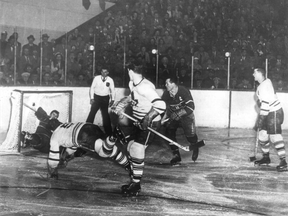 In this April 21, 1951 file photo, Toronto Maple Leafs defenceman Bill Barilko (diving) scores a Stanley-Cup winning goal in overtime against the Montreal Canadiens.