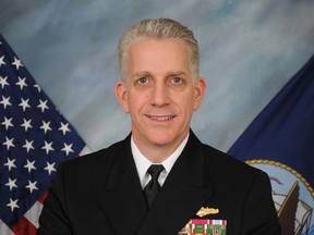 Rear Admiral Bruce F. Loveless faces charges related to bribery.