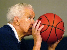 In this July 24, 2002 photo, Dr. Tom Amberry shoots a free throw in Seal Beach, Calif.