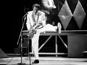 In this Oct. 17, 1986 file photo, Chuck Berry performs during a concert celebration for his 60th birthday at the Fox Theatre in St. Louis, Mo. On Saturday, March 18, 2017, police in Missouri said Berry has died at the age of 90.