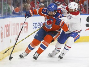 Andrew Shaw, right, of the Montreal Candiens pressures Edmonton Oilers' defenceman Oscar Klefhom during NHL action Sunday in Edmonton. The Canadiens spotted the Oilers a 1-0 lead after two periods before exploding with four third-period goals in a 4-1 victory.