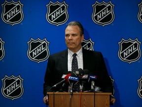 In this April 30, 2016 file photo, Winnipeg Jets GM Kevin Cheveldayoff speaks to reporters in Toronto.
