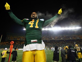 In this Nov. 16, 2014 file photo, Edmonton Eskimos defensive lineman Odell Willis celebrates a home playoff win over the Saskatchewan Roughriders.