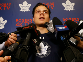In this July 4, 2016 file photo, Auston Matthews speaks to a throng of reporters at Toronto Maple Leafs development camp.