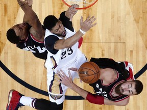 Toronto Raptors centre Jonas Valanciunas (right) battles for a rebound with New Orleans Pelicans centre Anthony Davis on March 8.