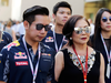 Vorayuth "Boss" Yoovidhya, left, whose grandfather co-founded energy drink company Red Bull, walks with his mother Daranee at the Formula 1 Grand Prix in Abu Dhabi on Nov. 26, 2016.