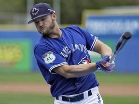 Toronto Blue Jays 3B Josh Donaldson takes practice swings before his turn in the batting cage before a spring training game against the Boston Red Sox on March 13.