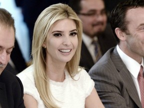Ivanka Trump, daughter of President Donald Trump, smiles during a meeting with the president and manufacturing executives in the State Dining Room of the White House on Feb. 23
