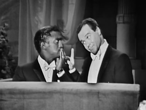 Sammy Davis, Jr. at the 1964 Oscars, alongside host Jack Lemmon.