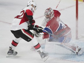 Chris Kelly of the Ottawa Senators is foiled by Montreal Canadiens' goaltender Carey Price during NHL action Sunday in Montreal. Price and the Canadiens were 4-1 winnes as they swept a weekend home-and-home set against the Senators in the battle for supremacy in the NHL's Atlantic Division.
