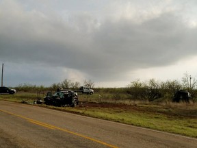 Texas Department of Public Safety troopers investigate a two-vehicle crash that left several storm chasers dead Tuesday, March 28, 2017, near Spur, Texas