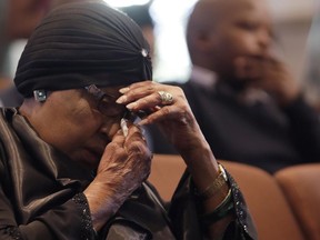 Former wife of the late former President Nelson Mandela, Winnie Madikizela-Mandela, listens to speeches during the memorial service for Ahmed Kathrada, at the Nelson Mandela Foundation in Johannesburg, South Africa, Tuesday, March 28, 2017