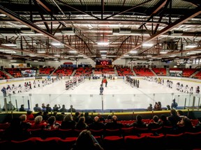 In this Jan. 8, 2016 file photo, minor hockey players prepare for competition at the Max Bell Centre in Calgary.