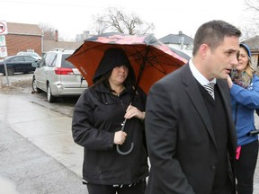 Ontario teacher Jaclyn McLaren arrives with her lawyer Pieter Kort at the Quinte Courthouse in Belleville, Ont., on March 7, 2017.