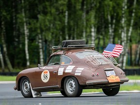 The Peking to Paris Motor Challenge is a race specifically for cars made before 1975. The couple's 1956 Porsche 356A is pictured.