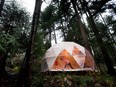 Nectar Yoga B&B owner Andrea Clark poses for a photo while practising yoga in the geodesic dome at her property on Bowen Island, B.C.