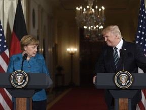 U.S. President Donald Trump and German Chancellor Angela Merkel hold a joint press conference in the East Room of the White House in Washington, DC, on March 17, 2017.