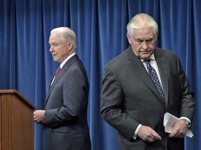 Attorney General Jeff Sessions, left, takes his turn to make a statement following Secretary of State Rex Tillerson, on issues related to visas and travel on Monday, March 6, 2017 in Washington.
