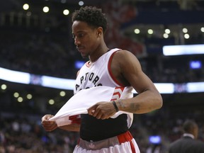 Toronto Raptors guard DeMar DeRozan walks off the court late in his team's loss to the Washington Wizards on March 1.