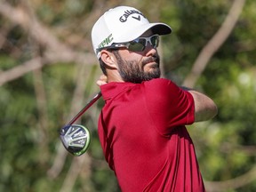 Adam Hadwin follows through on a drive on the 11th hole during the third round of the Valspar Championship golf tournament Saturday, March 11, 2017, at Innisbrook in Palm Harbor, Fla.