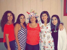 Guillermina Carrillo, centre, hoped her daughters, from left, Ana Carrillo, Elvia Zarate-Carrillo, Diana Carrillo and Brenda Carrillo, would never experience the kind of discrimination she did when she immigrated from Mexico.