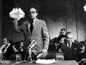 John Dean is sworn in before testifying to the Senate Watergate Committee on June 25, 1973.