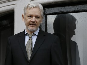 In this Feb. 5, 2016 file photo, WikiLeaks founder Julian Assange speaks from the balcony of the Ecuadorean Embassy in London.