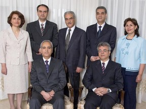 The seven Baha'i prisoners photographed several months before their arrest.