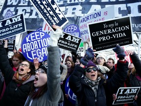 Anti-abortion activists try to block pro-choice activists as the annual March for Life passes by in front of the U.S. Supreme Court January 22, 2015 in Washington, DC.