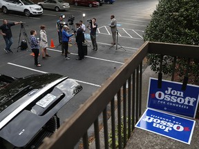 Democratic candidate Jon Ossoff speaks with the media after holding an election day kickoff rally as he runs for Georgia's 6th Congressional District in a special election to replace Tom Price, who is now the secretary of Health and Human Services on April 18, 2017 in Atlanta, Georgia. The election will fill the congressional seat that has been held by a Republican since the 1970s.