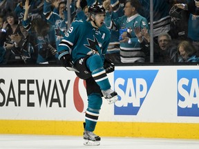 Logan Couture of the Sharks celebrates after scoring a goal against the Edmonton Oilers during the first period of Game 4 of their Western Conference first round playoff series on Tuesday night at SAP Center in San Jose, Calif.