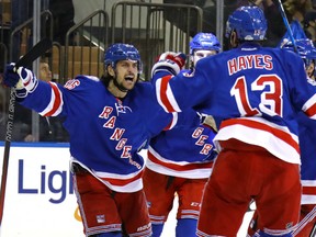 Mats Zuccarello celebrates with his Rangers teammates after scoring his second goal against the Montreal Canadiens during the second period of Game 6 of the Eastern Conference first-round series at Madison Square Garden in New York on Saturday night.
