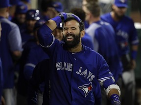 Toronto Blue Jays' Jose Bautista celebrates his three-run home run in the 13th inning against the Los Angeles Angels on Friday night.