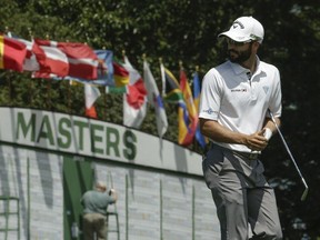 Adam Hadwin walks up the ninth fairway during the third round of the Masters golf tournament Saturday, April 8, 2017, in Augusta, Ga.