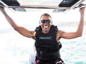 Former U.S. president Barack Obama pictured during a kitesurfing off the coast of Moskito Island in February 2017