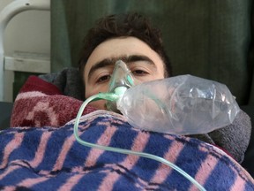 A Syrian man receives treatment at a small hospital in the town of Maaret al-Noman following a suspected toxic gas attack in Khan Sheikhun, a nearby rebel-held town in Syrias northwestern Idlib province, on April 4, 2017. Warplanes carried out a suspected toxic gas attack that killed at least 35 people including several children, a monitoring group said. The Syrian Observatory for Human Rights said those killed in the town of Khan Sheikhun, in Idlib province, had died from the effects of the gas, adding that dozens more suffered respiratory problems and other symptoms.