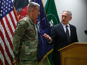 US Defense Secretary James Mattis (R) and US Army General John Nicholson (L), commander of US forces in Afghanistan, hold a news conference at Resolute Support headquarters in Kabul on April 24, 2017.