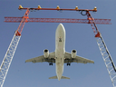 An Air Canada flight makes its final approach as it lands at Pearson International Airport in Toronto.