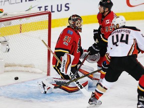 Anaheim Ducks' Nate Thompson scores a goal against Flames netminder Chad Johnson during the first period of Game 4 of their Western Conference quarter-final series on Wednesday night in Calgary.